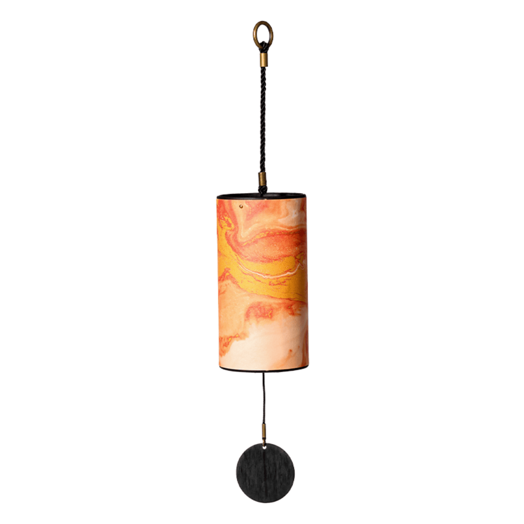 Handcrafted wind chime with marbled orange-yellow design, soothing musical instrument for peace and mindfulness