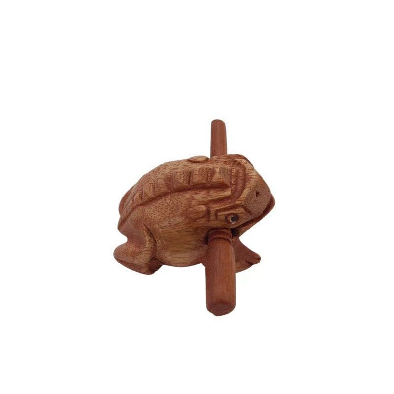 Hand-carved wooden frog percussion instrument with mallet, ideal for calming sound therapy and musical play