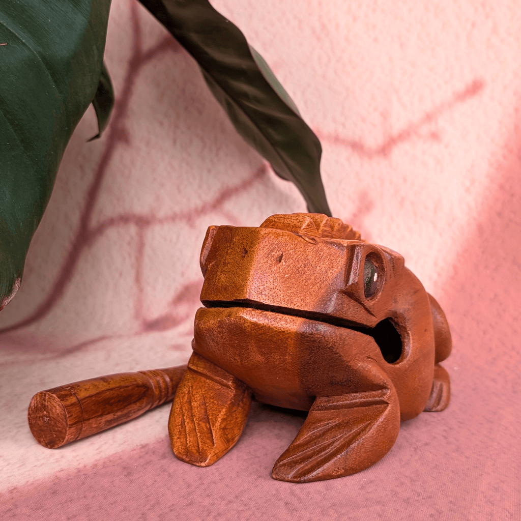 Hand-carved wooden frog percussion instrument with mallet, perfect for healing sound and mindfulness
