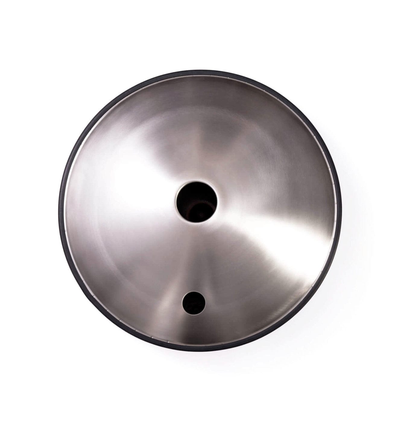 Handpan drum interior with central hole and resonant steel surface, ideal for healing sound therapy