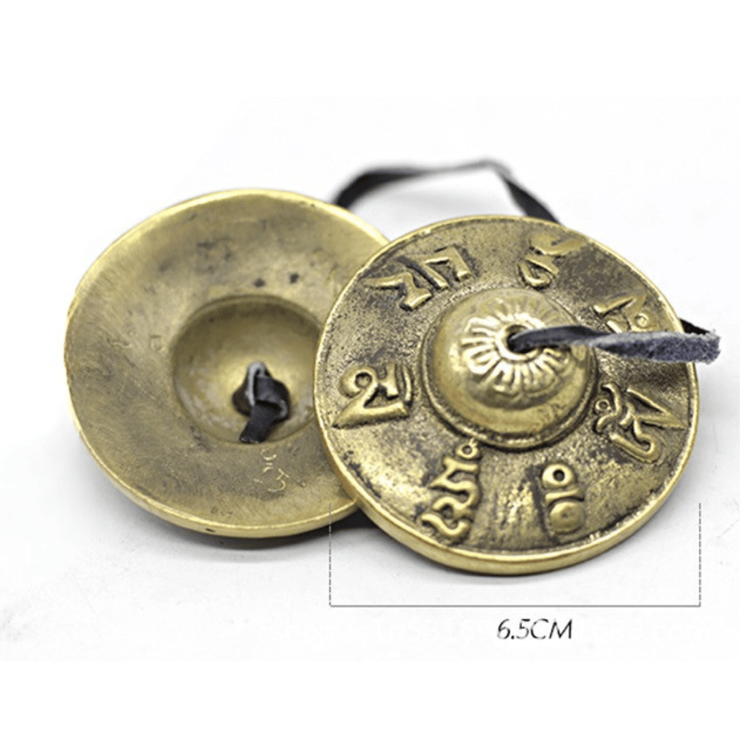 6.5cm brass Tibetan singing cymbals with sacred script, ideal for meditation and healing sound therapy