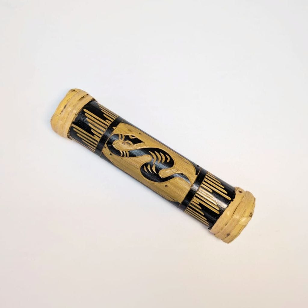 Handcrafted bamboo rainstick with black scorpion design, soothing musical instrument for relaxation and meditation