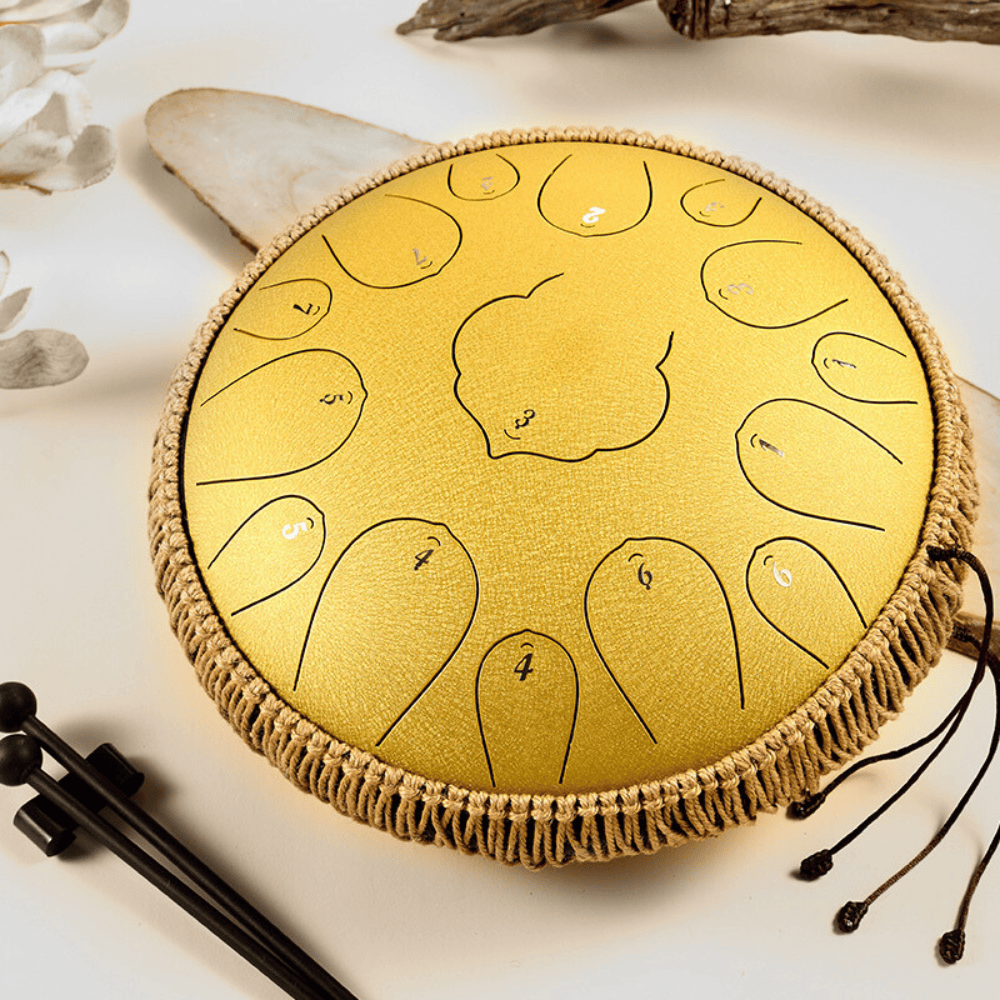Golden handpan with numbered notes, woven edge, and mallets — healing musical instrument for peace and creativity