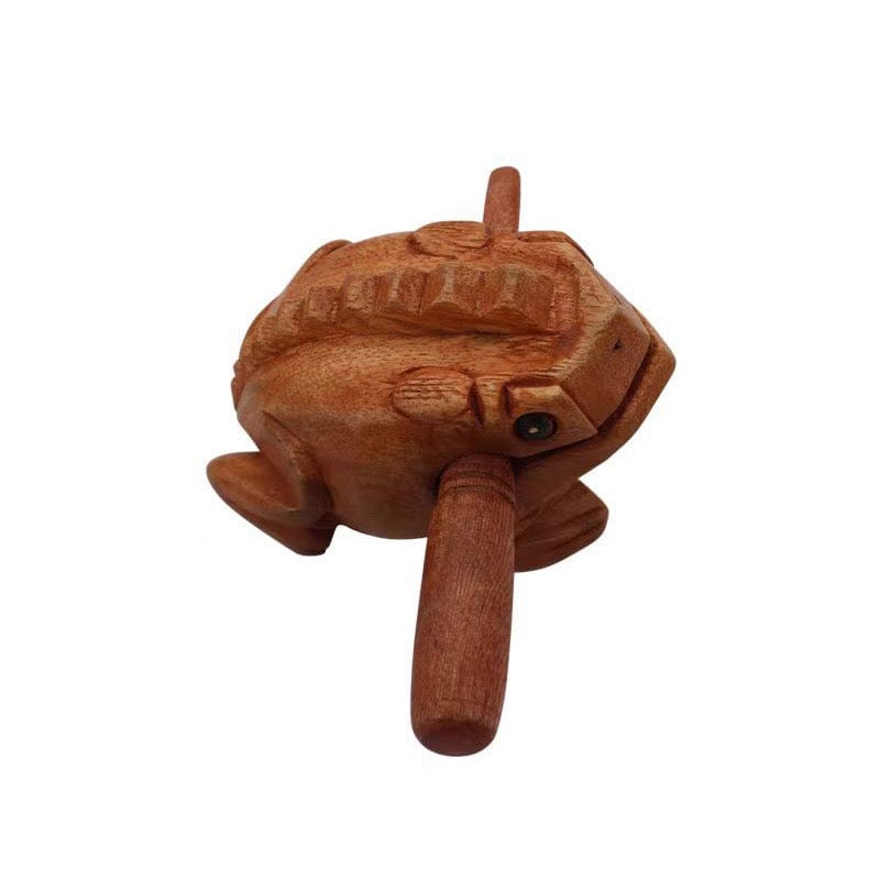 Hand-carved wooden frog percussion instrument with mallet, natural wood grain texture