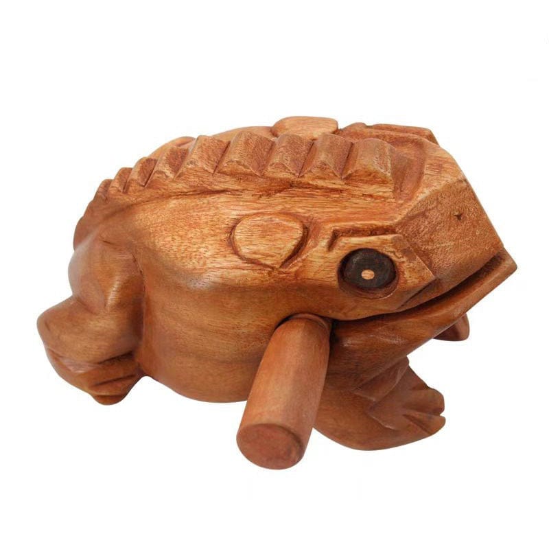 Hand-carved wooden frog percussion instrument with mallet, unique musical decor for healing sound