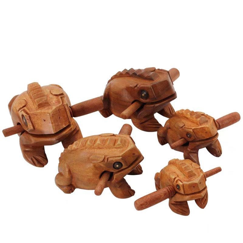 Hand-carved wooden frog percussion instruments for rhythmic music and meditation
