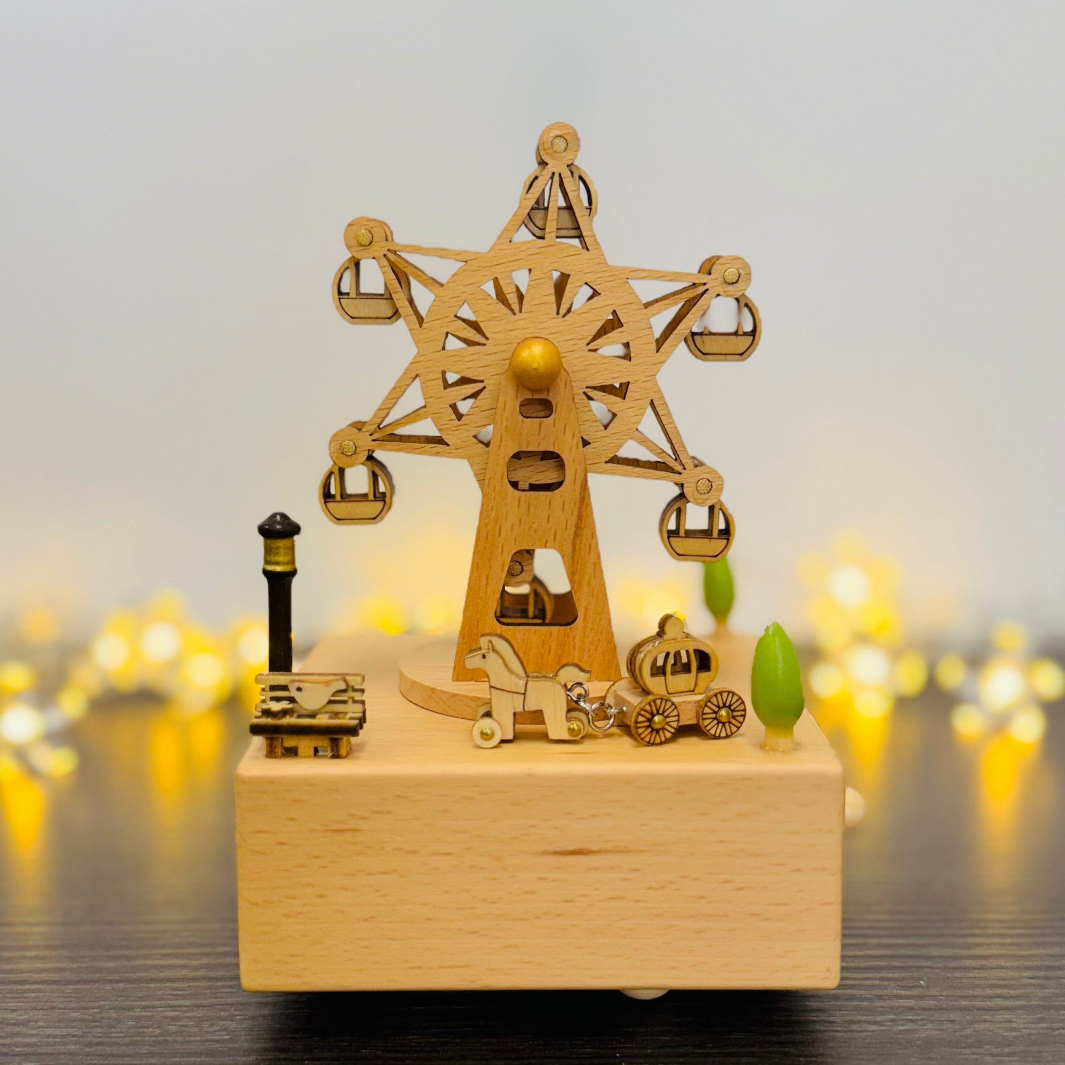 Wooden musical box with Ferris wheel, horse carriage, and trees, perfect for calming ambiance and decor.