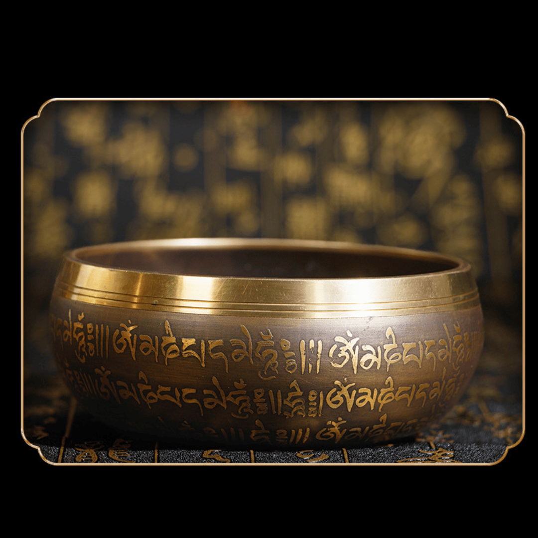 Golden singing bowl with Tibetan script, ideal for meditation and healing sound therapy