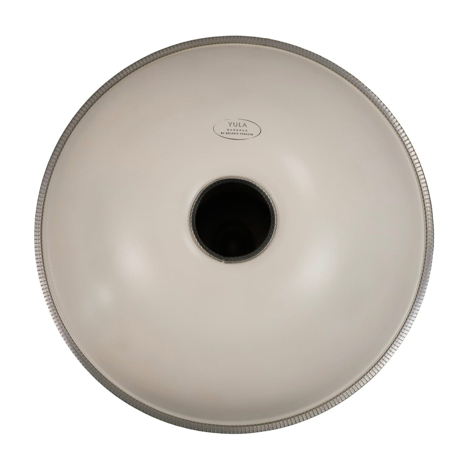 Yula Handpan by Melodic Forest — sleek, cream-colored healing musical instrument with central sound hole